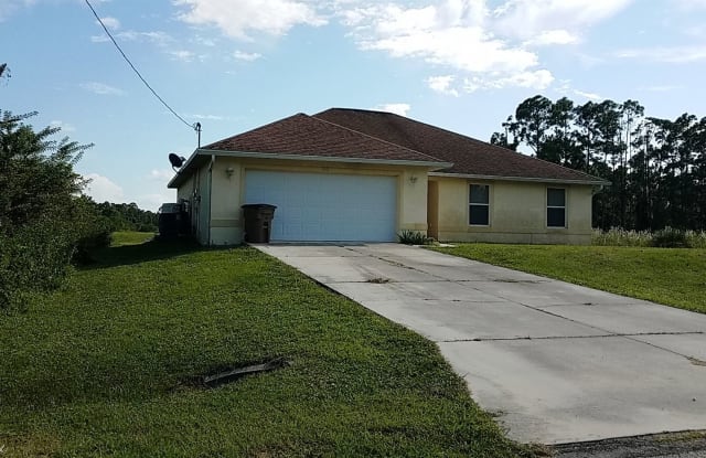 952 Lakeside Dr - 952 Lakeside Drive, Lehigh Acres, FL 33974