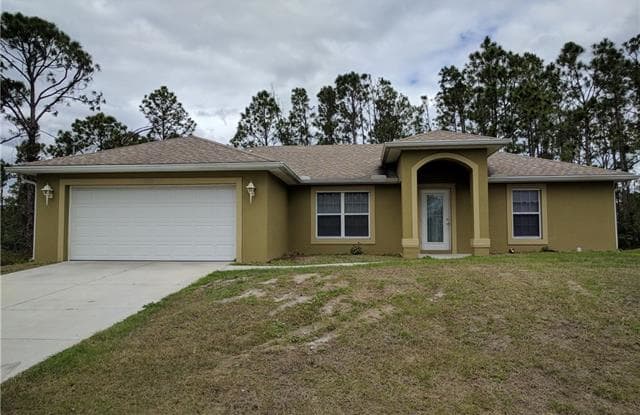 1023 Maddock ST E - 1023 Maddock Street East, Lehigh Acres, FL 33974