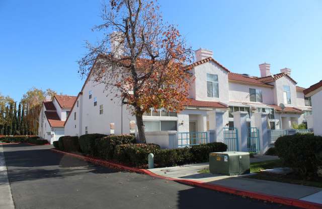 Gated Community~$2,595~ 2 Bed/2.5 Bath End Unit Townhome.
