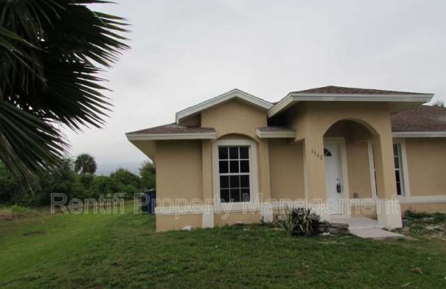 1562 Gilbert Ave S - 1562 Gilbert Avenue South, Lehigh Acres, FL 33973