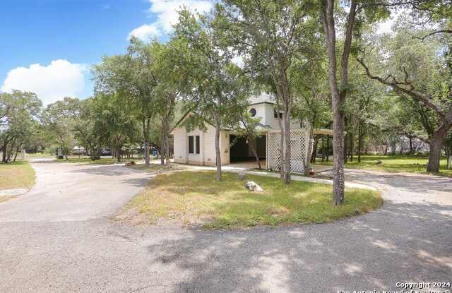 7702 SHADY HOLLOW LN