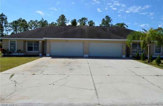 355 Justice Avenue E - 355 Justice Avenue, Lehigh Acres, FL 33972