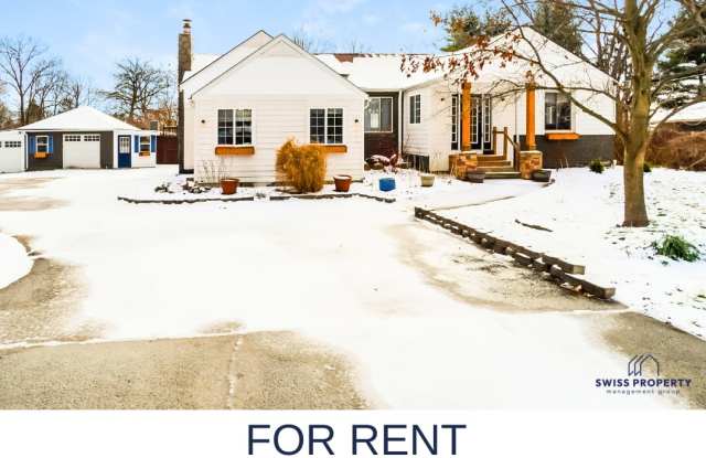 Photo of Updated 4-Bedroom Home with Pool, Modern Kitchen  Finished Lower Level