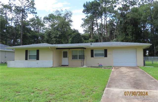 6633 E Holly Street