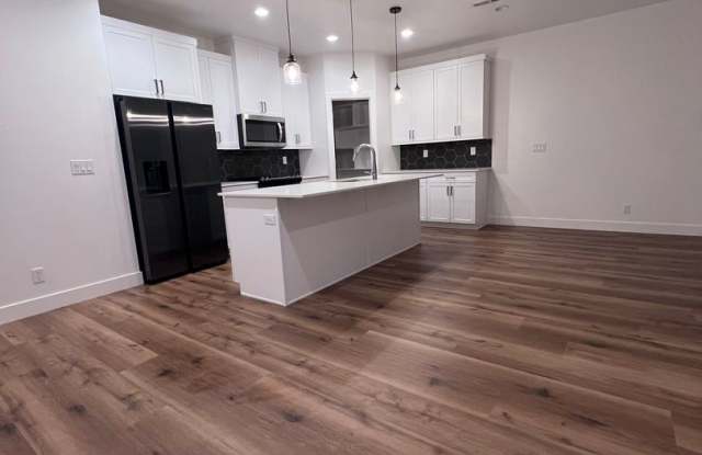 Stylish Desert Ridge Townhome with Modern Finishes  2-Car Garage