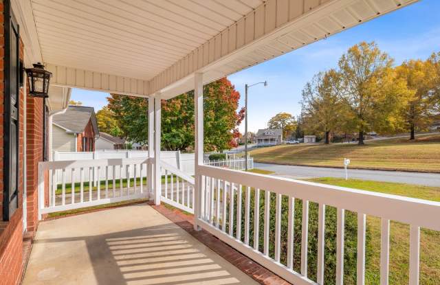 SW - Like New Home! Newer SS Appliances  Cabinets, Ceiling Fans, Blinds, Front Porch and Deck. Musts See!