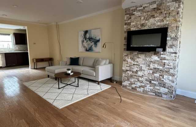 Philadelphia Rental with Modern Finishes and Stone Accent Wall.