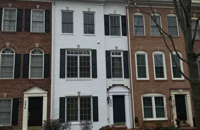 Beautiful 4BR 4.5BA 4 level townhome with 2 car attached garage located in the Fallsgrove Community