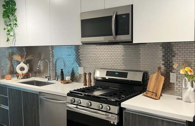 Brand New Building featuring 1  2 bedroom Flats  Townhomes!