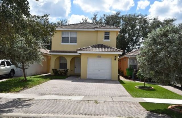 9318 Northwest 54th Street - 9318 Northwest 54th Street, Sunrise, FL 33351