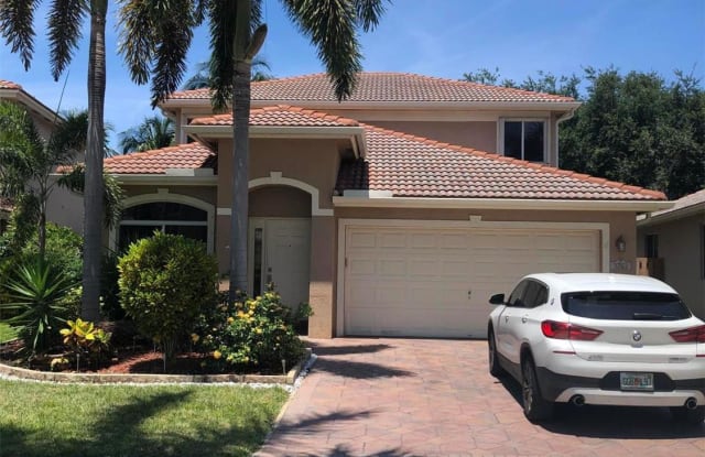 3763 Woodfield Drive - 3763 Woodfield Drive, Coconut Creek, FL 33073