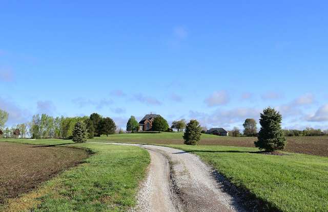 Large Acreage 5/5 with Pond!