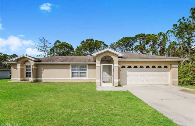 909 Palmetto Avenue - 909 Palmetto Avenue, Lehigh Acres, FL 33972