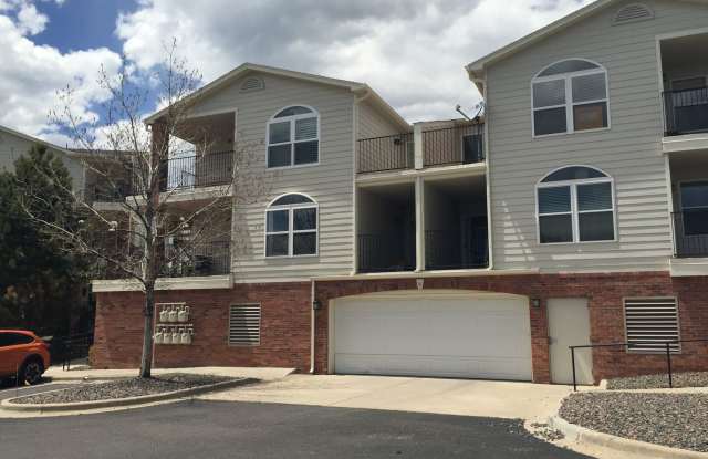 Available Now- 2 Bed/2 Bath Top Floor Condo with Covered Garage Space and Additional Storage