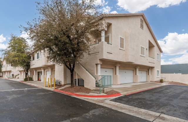 Photo of 1st floor unit in gated community with golf course view