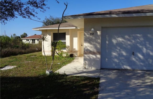 772 Eisenhower BLVD - 772 Eisenhower Blvd, Lehigh Acres, FL 33974