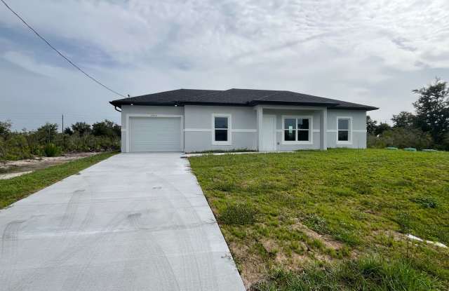 NEW CONSTRUCTION- Modern 3 Bed / 2 Bath Home in Lehigh Acres
