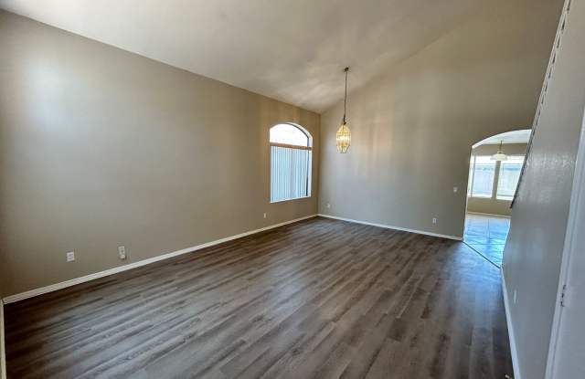 Spacious 4-Bedroom 3-Bath Peoria Home with Vaulted Ceilings  Large Backyard