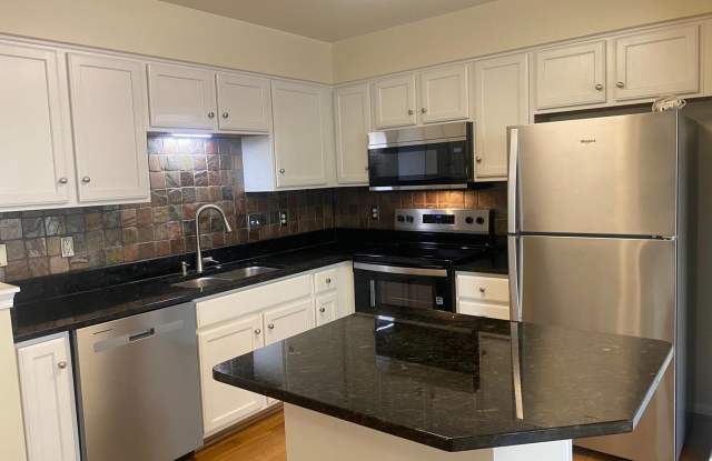 7049 ROGUE FOREST LN