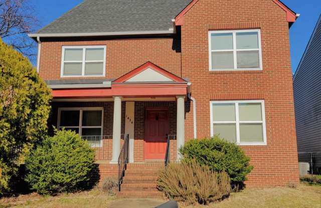 Large single family residence in Wallace Manor on corner lot.