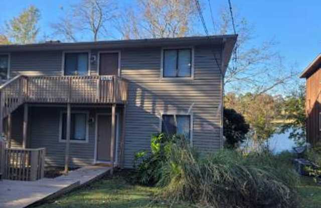 WATERFRONT 2/2 in the SE w/ New Paint, Screened Porch,  Solid Floors (No Carpet)! Available October 1st for $1250/month!