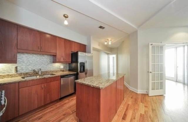 Photo of Gorgeous 2b/2ba in Uptown w/ Private Patio, In-Unit W/D, Massive Roof Deck and Elevator