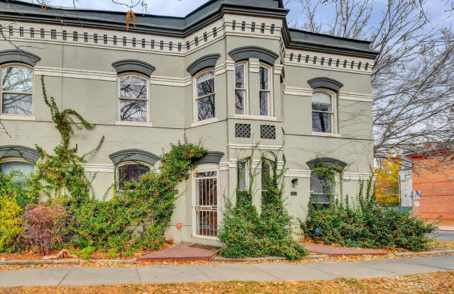 Photo of Architecturally Stunning Curtis Park Townhome With Historic Charm