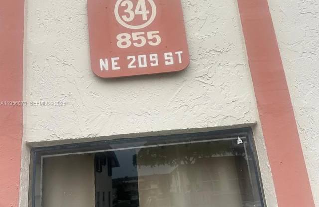855 NE 209th St