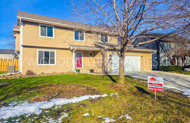 Photo of Beautiful 4-Bedroom Home in Johnston – with Finished basement and bonus room and a fenced yard.