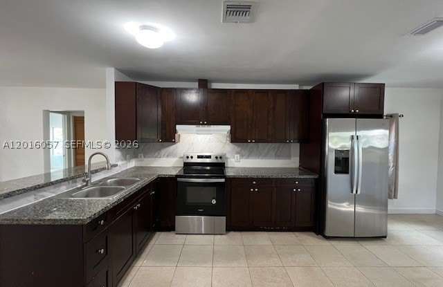 1036 NW 64th St