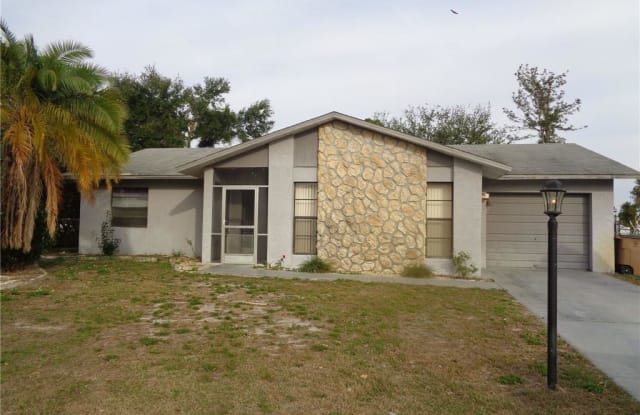 423 Rushmore AVE S - 423 Rushmore Avenue South, Lehigh Acres, FL 33936