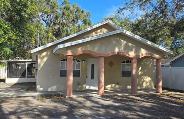 Spacious 3-Bedroom, 2-Bath Home with Covered Screened Porch  Large Kitchen in Tampa