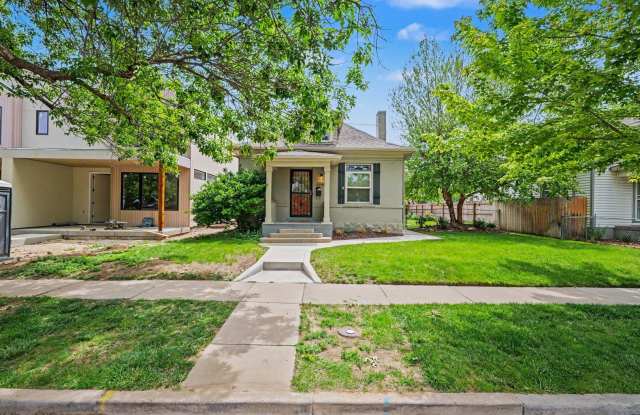 Beautifully Preserved Englewood Home with Fenced Backyard