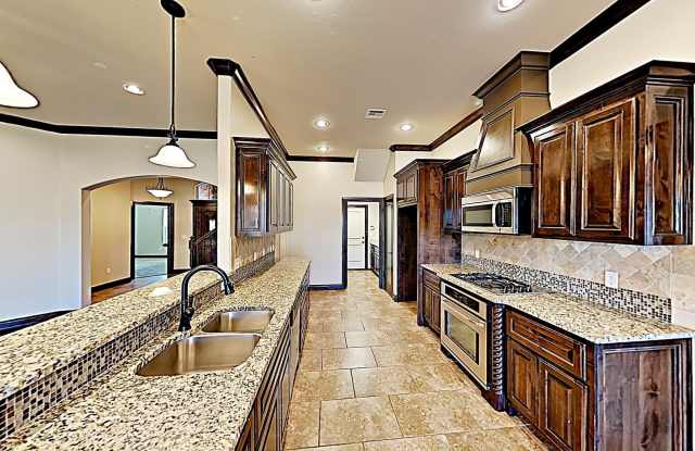 Photo of Luxury 4 Bedroom, 2.5 Bath Home with Bonus Room and Storm Shelter in Deer Creek Schools.