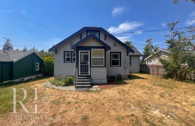 Beautifully Renovated Classic Home with Three Levels of Living, Sunroom & Spacious Kitchen