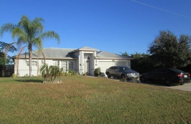 219 Grant BLVD - 219 Grant Blvd, Lehigh Acres, FL 33974