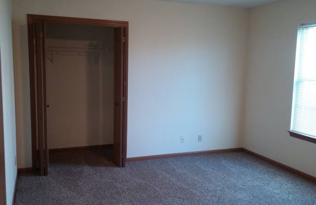 Photo of Wake up to a stunning pond view in this beautiful 2 BD 2BA duplex with a 2 car attached garage