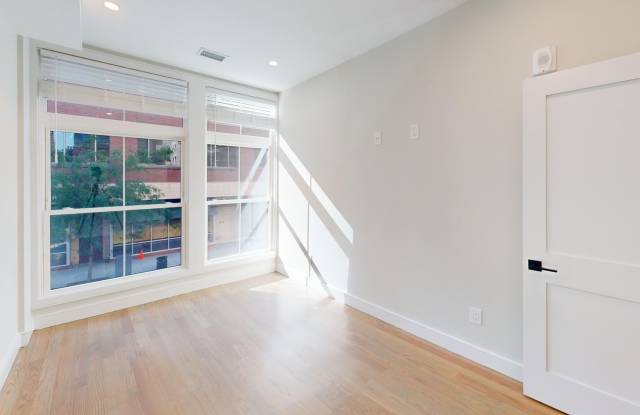 $1k Rebate w Rental! Lux Apt w 2 baths  XL rooms in THEATER DISTRICT! Laundry in Unit!