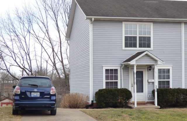 Lovely, Spacious Townhouse! Off-Street Parking, W/D Included, Full Basement, Pets Ok!