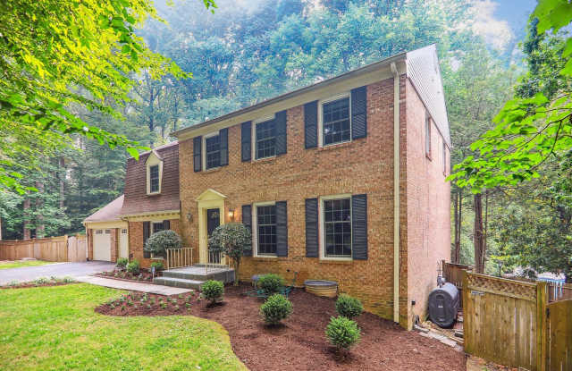 5 BR 4.5 BA home with inground heated pool and extensive hardscape!