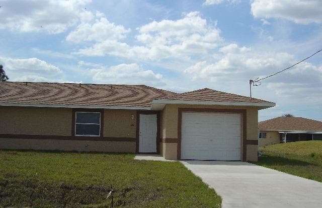 202 Hightower AVE S - 202 Hightower Ave S, Lehigh Acres, FL 33973