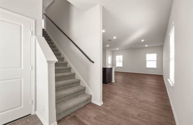 **4 Weeks Free and 50% Security Deposit!!** Welcome to 120 Chipping Alley — a like-new home in the prestigious golf course community of Floresville, TX!