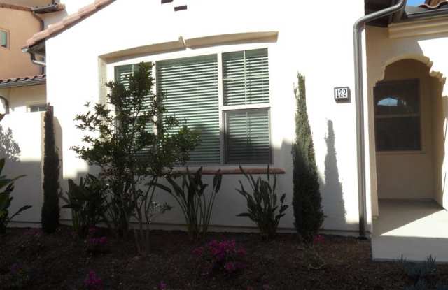 4BR 3BA two-story condo with 2 Car Attached Garage