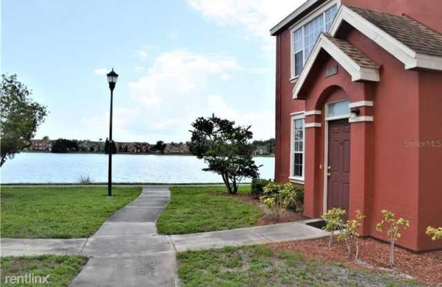 9176 Lake Chase Island Way - 9176 Lake Chase Island Way, Westchase, FL 33626