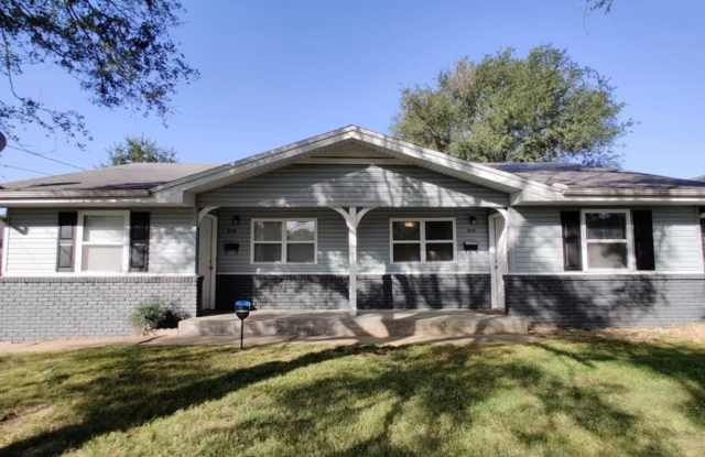 2 bedroom, 1 bathroom duplex with covered parking