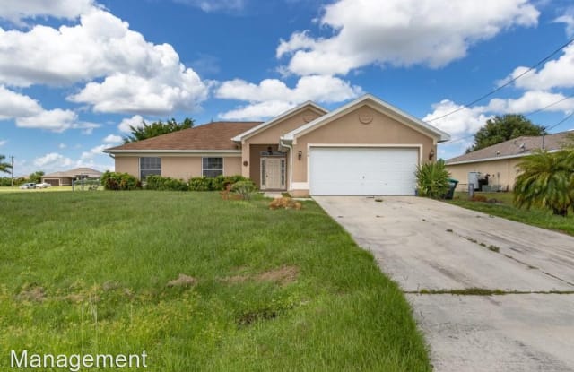 206 NW 25th Place - 206 NW 25th Pl, Cape Coral, FL 33993