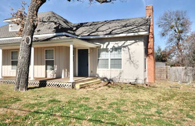 FOR LEASE! Remodeled 2 Bedroom - 1 Bath Duplex with New Interior Paint  Wood Floors.