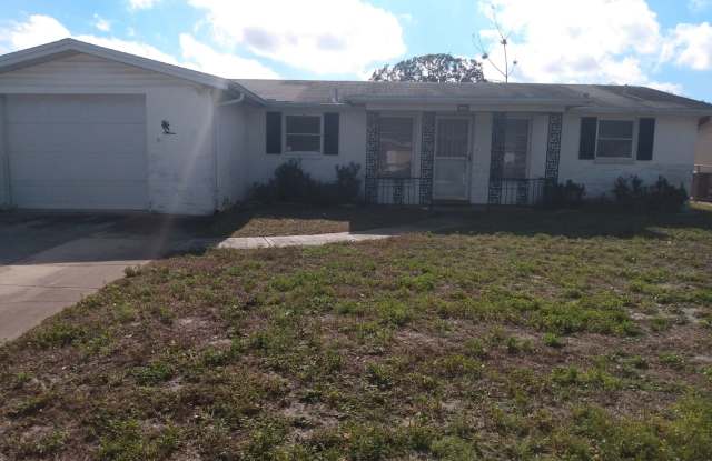 2 Bed/2 Bath 1200 Sq. Ft. home with BONUS ROOM, indoor laundry & a fenced yard!!