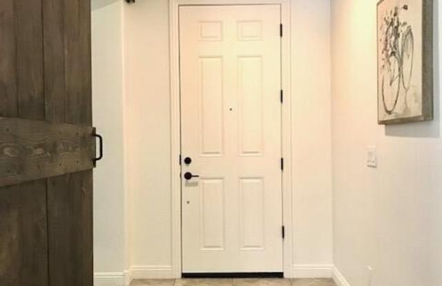 10835 E THATCHER Avenue