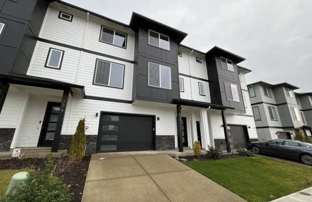 Brand New Modern Open-Concept Condo with Kitchen Island, Granite Counters and a Deck